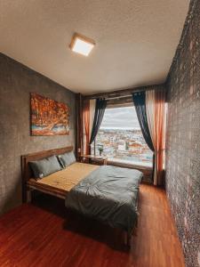 Postel nebo postele na pokoji v ubytování Ô Cửa Mùa Thu