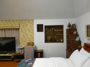Televisyen dan/atau pusat hiburan di Jilufugan B&B