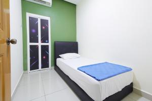 Postel nebo postele na pokoji v ubytování Hotel 3Winz, Chow Kit Hospital Kuala Lumpur