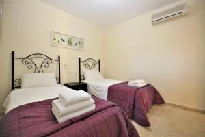 Posteľ alebo postele v izbe v ubytovaní Apartment ANGELIKA + 14 fotografií