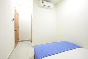 Postel nebo postele na pokoji v ubytování Hotel 3Winz, Chow Kit Hospital Kuala Lumpur