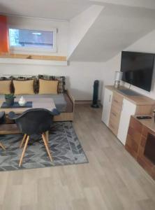 TV a/nebo společenská místnost v ubytování Apartmán POHODA Javorník