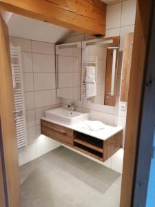 Een badkamer bij Gästehaus Haag