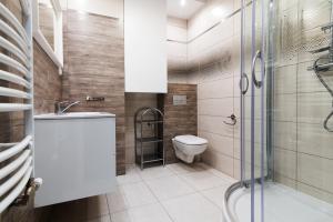 Koupelna v ubytování Apartamenty Spokojna 24C + 6 fotografií
