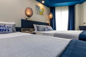 A bed or beds in a room at Narcia Resort Side - Ultra All Inclusive