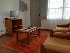Μια τηλεόραση ή/και κέντρο ψυχαγωγίας στο Velas de S. Jorge AL 235