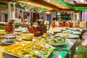 a buffet with many plates of food on a table at Kubler Stars in Karlsruhe