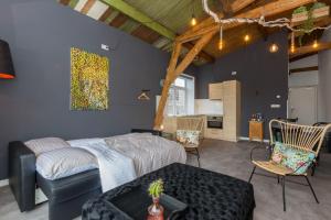 Postel nebo postele na pokoji v ubytování Groepsappartement- Dorpsplein 6 Koudekerke Pleinzicht