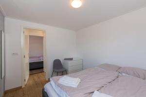 Postel nebo postele na pokoji v ubytování Holidayhouse - Inlaag 20 Wolphaartsdijk