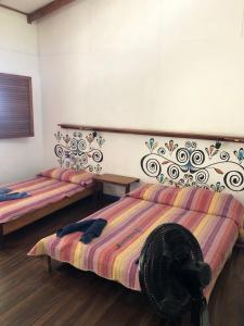 Postel nebo postele na pokoji v ubytování El Pargo Feliz