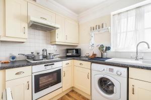 Köök või kööginurk majutusasutuses CONEN Chafford Apartment +21 fotot