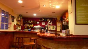 Loungen eller baren på Hostal Cabrera