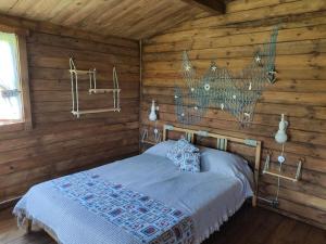 Postel nebo postele na pokoji v ubytování CAMPING A GRANDELLA