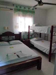 Krevet ili kreveti na kat u jedinici u objektu Hotel Mansión del Cesar