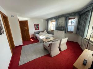 Posezení v ubytování Hotel Alpin