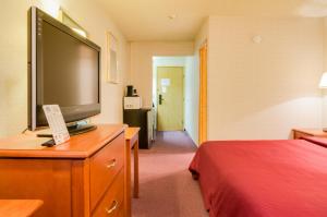 Voodi või voodid majutusasutuse GuestHouse Inn Fife toas