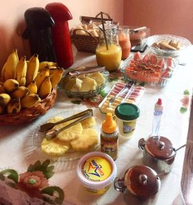 a table with a bunch of food on it at Pousada Mont Hebrom in Ibicoara +22 photos