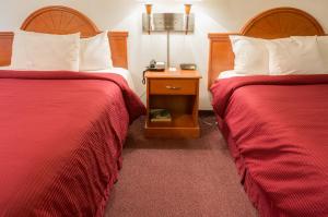 Voodi või voodid majutusasutuse GuestHouse Inn Fife toas