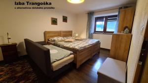 Posteľ alebo postele v izbe v ubytovaní Villa Korálka
