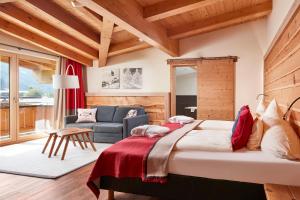 Ένα ή περισσότερα κρεβάτια σε δωμάτιο στο Hotel Hasenauer 4 Sterne Superior