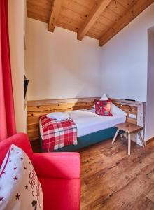 Ένα ή περισσότερα κρεβάτια σε δωμάτιο στο Hotel Hasenauer 4 Sterne Superior
