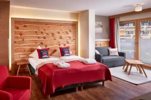 Ένα ή περισσότερα κρεβάτια σε δωμάτιο στο Hotel Hasenauer 4 Sterne Superior