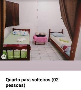 Ένα ή περισσότερα κρεβάτια σε δωμάτιο στο Hostel Casa Shamballa
