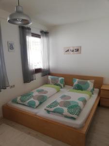 Postel nebo postele na pokoji v ubytování Haus Barbara