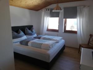 Postel nebo postele na pokoji v ubytování Haus Barbara