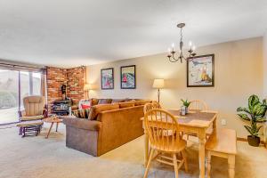 a living room with a couch and a table at 24 Northface Circle in North Conway