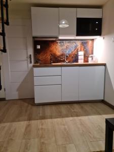 Kuchyňa alebo kuchynka v ubytovaní Amber Hostel