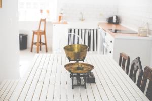 a scale sitting on top of a kitchen table at Sintra1012 Boutique Guesthouse in Sintra