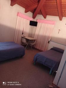 Ein Bett oder Betten in einem Zimmer der Unterkunft Locanda Alla Stazione