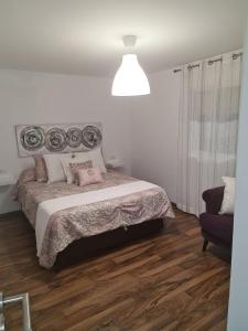 Postel nebo postele na pokoji v ubytování CASA OLGA