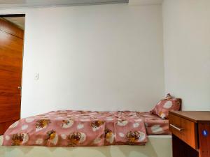 Postel nebo postele na pokoji v ubytování Hotel Central Fusa