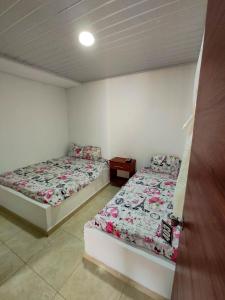 Postel nebo postele na pokoji v ubytování Hotel Central Fusa