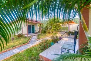 Κήπος έξω από το The Travelers Friend