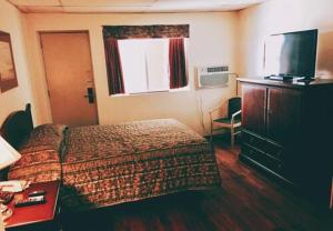 Katil atau katil-katil dalam bilik di Hi Valley Motor Inn