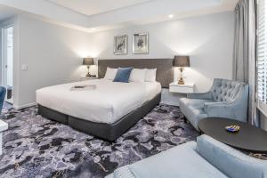 Ένα ή περισσότερα κρεβάτια σε δωμάτιο στο Hotel Kingsley