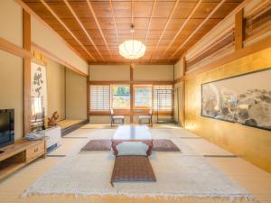 Postel nebo postele na pokoji v ubytování 高野山 宿坊 恵光院 -Koyasan Syukubo Ekoin Temple-