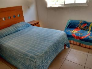 Krevet ili kreveti u jedinici u objektu Departamento en Acapulco Diamante - Puente del Mar