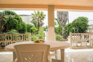 A balcony or terrace at Cozy House, Santa Maria del Focallo, Fireplace