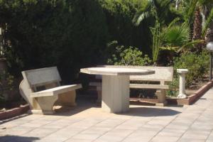 A garden outside Cozy House, Santa Maria del Focallo, Fireplace