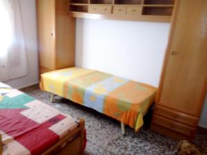 Letto o letti in una camera di 2 bedrooms house with shared pool and enclosed garden at Cartagena