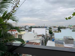 a view of a city from a balcony at Ngoi Sao Phuong Nam Hotel in Ho Chi Minh City