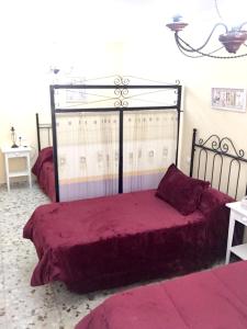 Katil atau katil-katil dalam bilik di 4 bedrooms villa with private pool terrace and wifi at Mesas de Guadalora