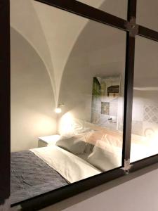 Een bed of bedden in een kamer bij Studio with wifi at Catania 3 km away from the beach