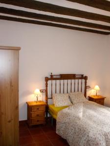 Giường trong phòng chung tại Elegant Villa in Villa de Ves with Private Pool