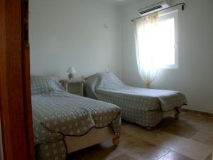 Postel nebo postele na pokoji v ubytování Villa confortable avec piscine privée à Saint-Saturnin-lès-Apt + 16 fotografií