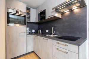 Kuchyň nebo kuchyňský kout v ubytování Apartment Rainer - mittendrin